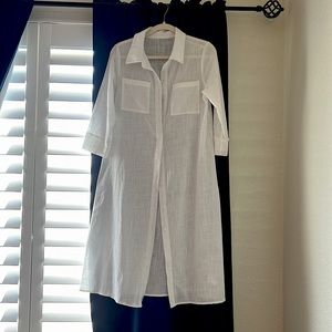 Linen shirt dress or beach cover up. Not lined. Fits 0-2.